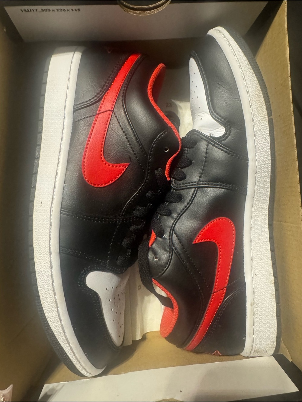 Jordan Air Jordan 1 Low in Black, Fire Red and White